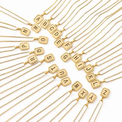 Gold plated stainless steel initial necklace with letter pendants