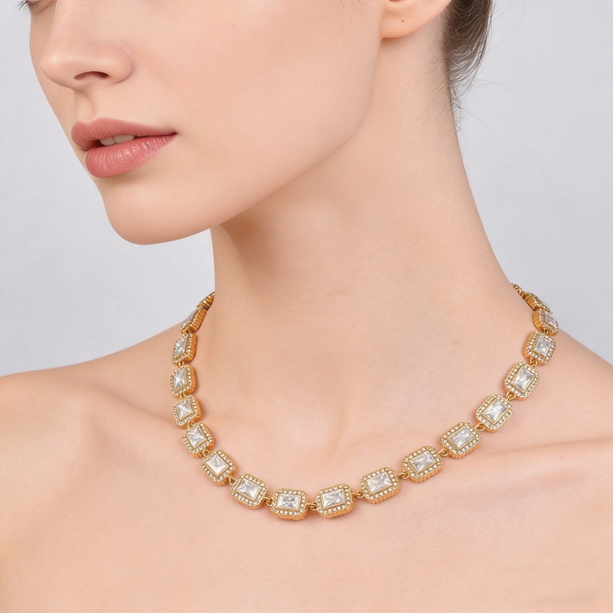 Rectangular crystal tennis necklace worn by a model