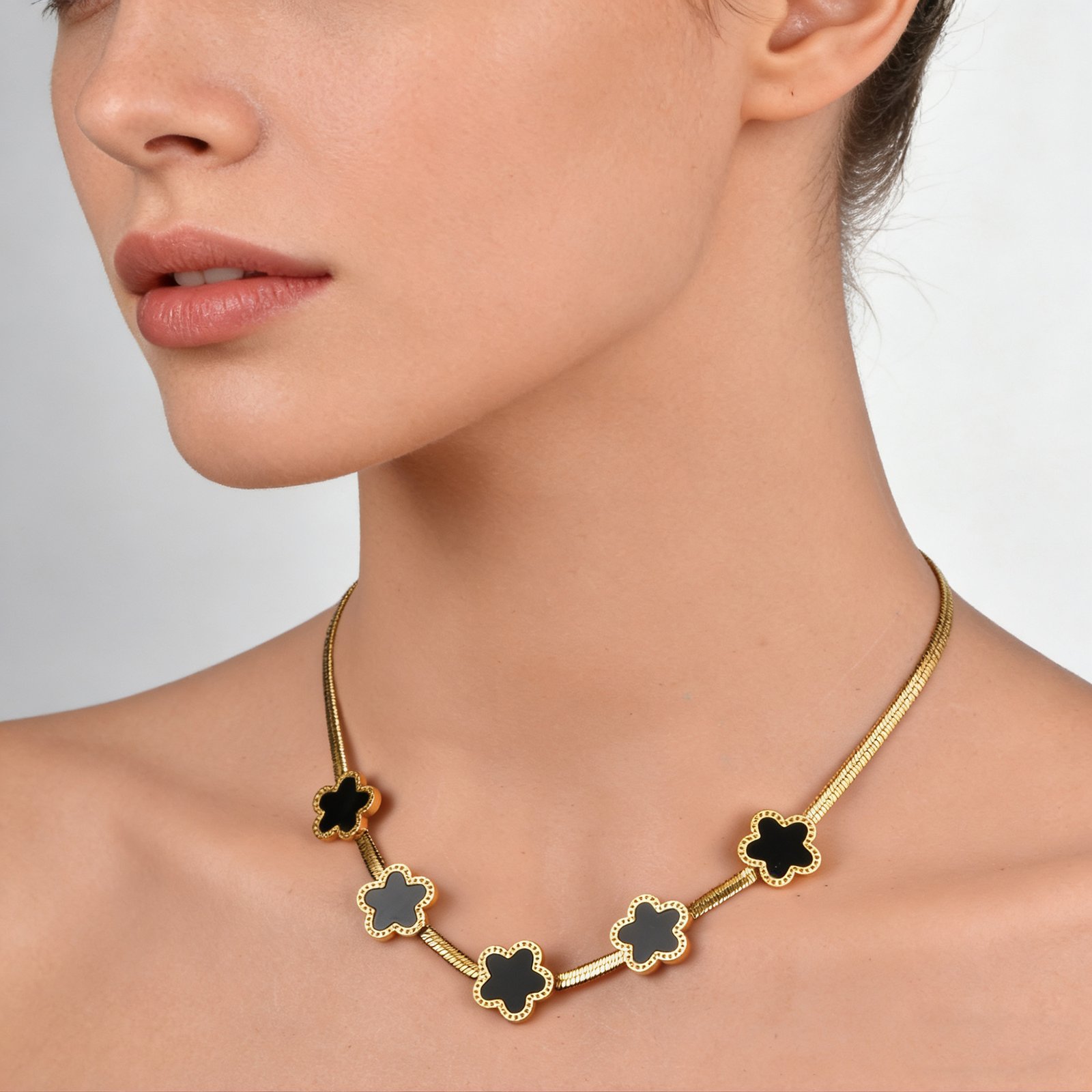 Gold plated flower charm necklace