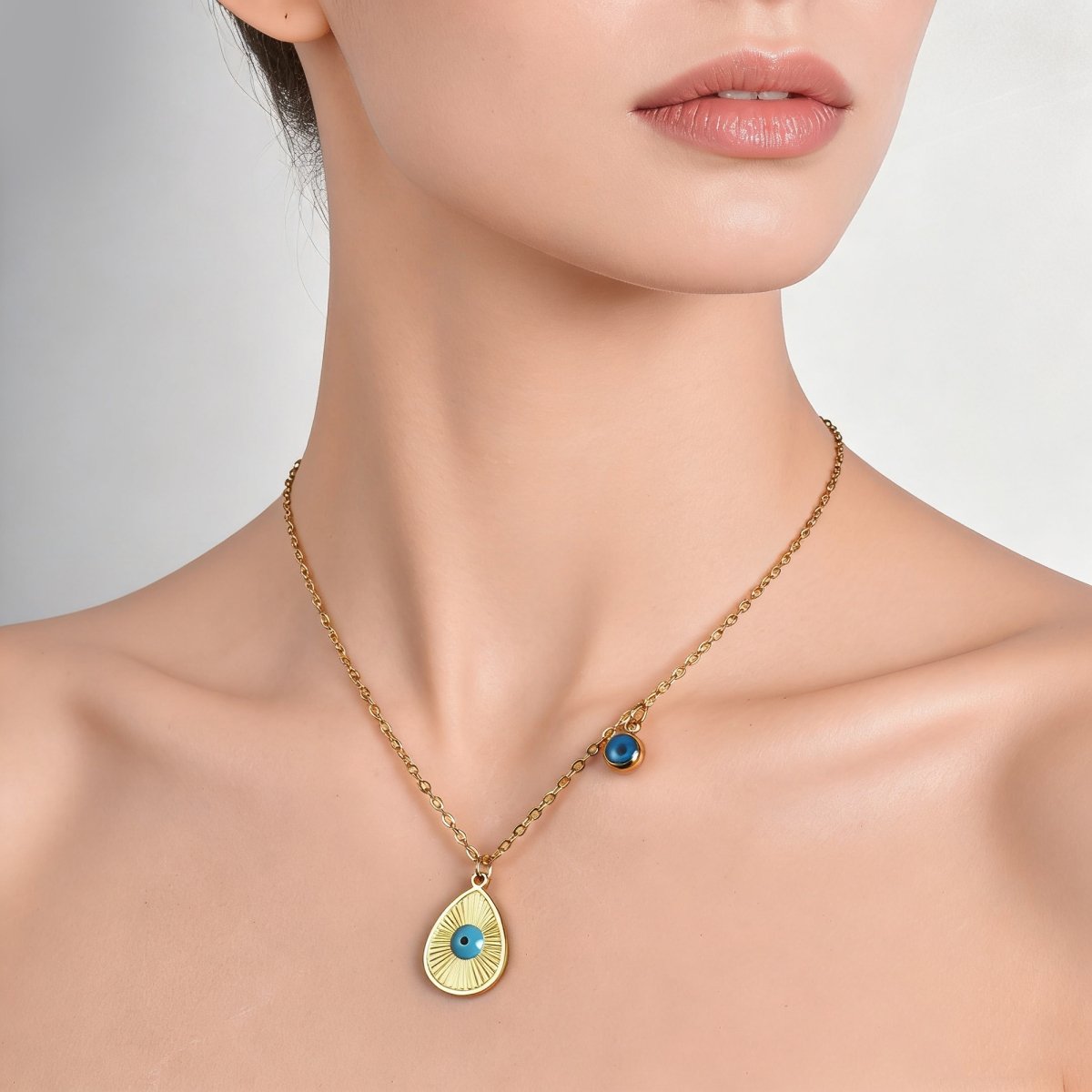 Gold plated stainless steel evil eye necklace with blue eye pendant