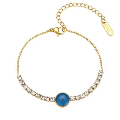 Gold plated stainless steel blue stone bracelet with crystal accents