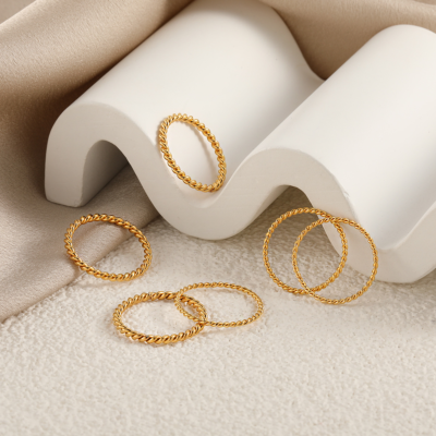 Twisted stainless steel ring set with gold plating for wholesale jewelry