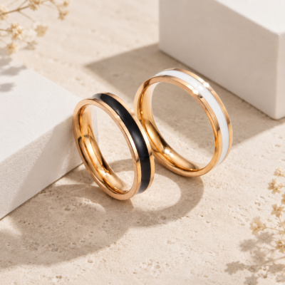 Rose gold stainless steel enamel stripe band rings with black and white enamel details