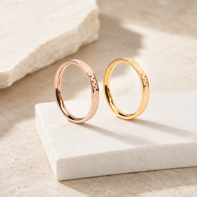 Gold and rose gold stainless steel textured band rings with minimalist design