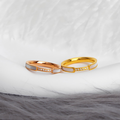 Gold and rose gold stainless steel enamel crystal band rings with white enamel details