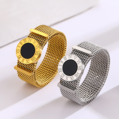 Gold and silver stainless steel roman mesh band rings with black round detail