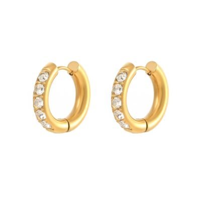 Gold stainless steel crystal huggie earrings on white background