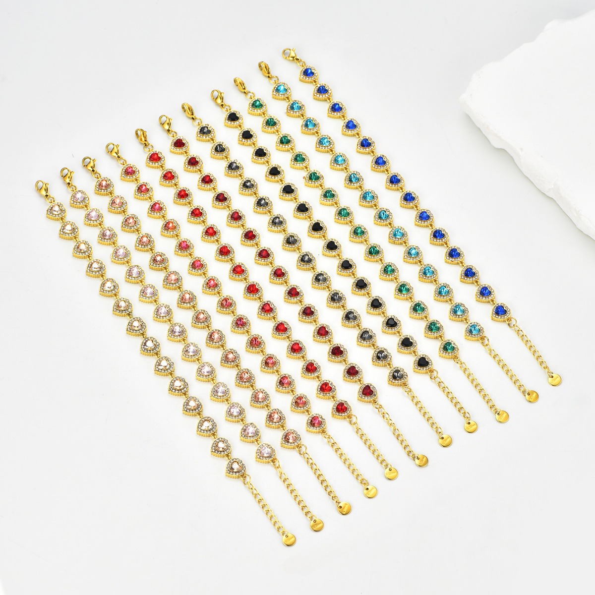 Gold heart crystal bracelets in white, pink, red, black, green, blue and multicolor stone options