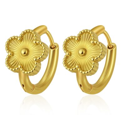 gold flower hoop earrings on white background