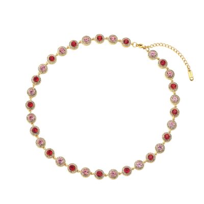 Gold halo crystal necklace with red and pink stones on white background