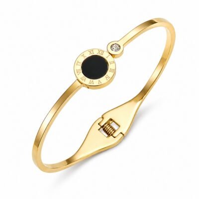 Gold stainless steel roman numeral bangle on white background