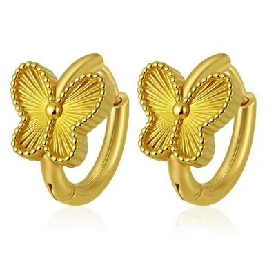 gold butterfly hoop earrings on white background