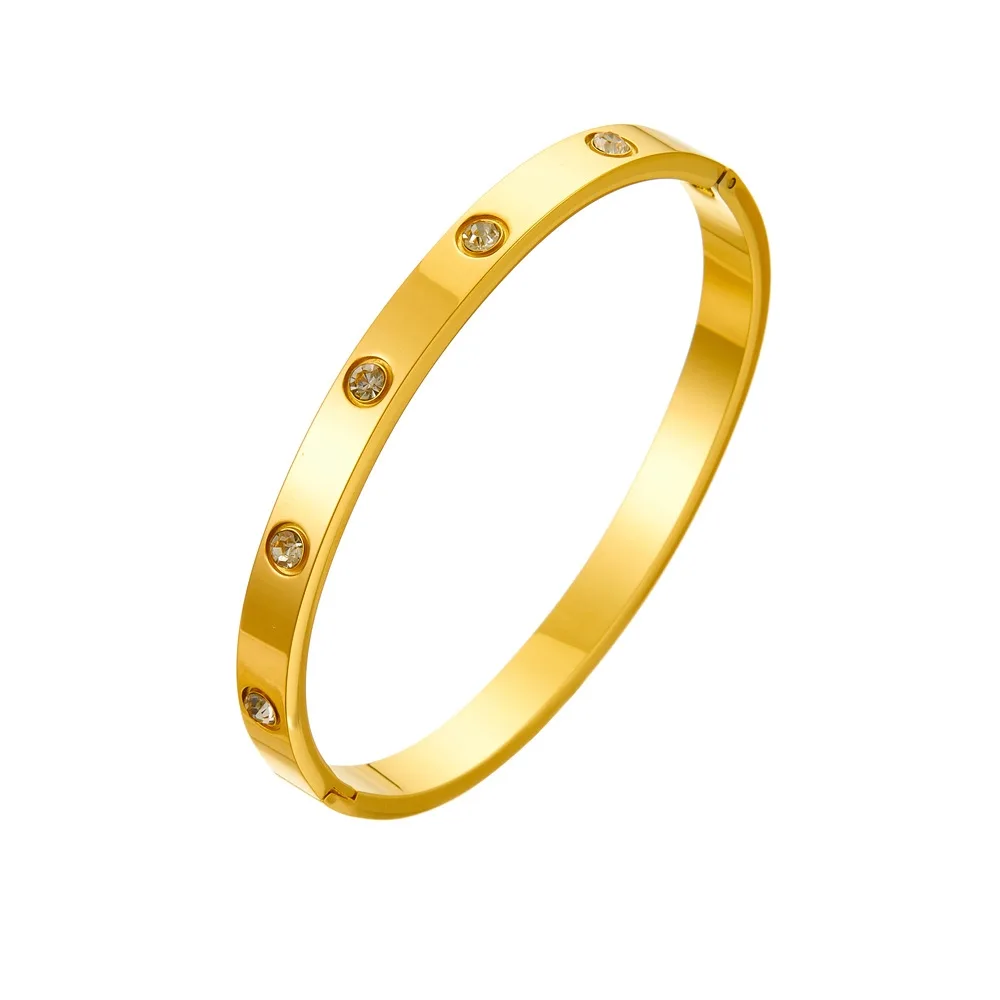 gold crystal stud bangle on white background
