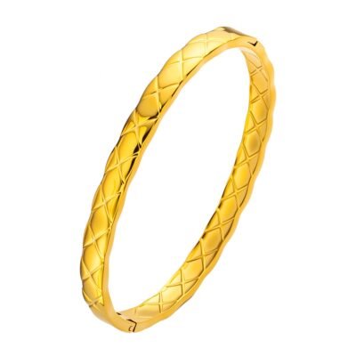 Gold stainless steel textured bangle with engraved cross-line pattern on white background