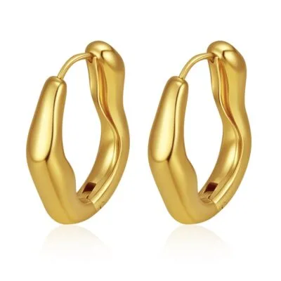 gold oval hoop earrings on white background