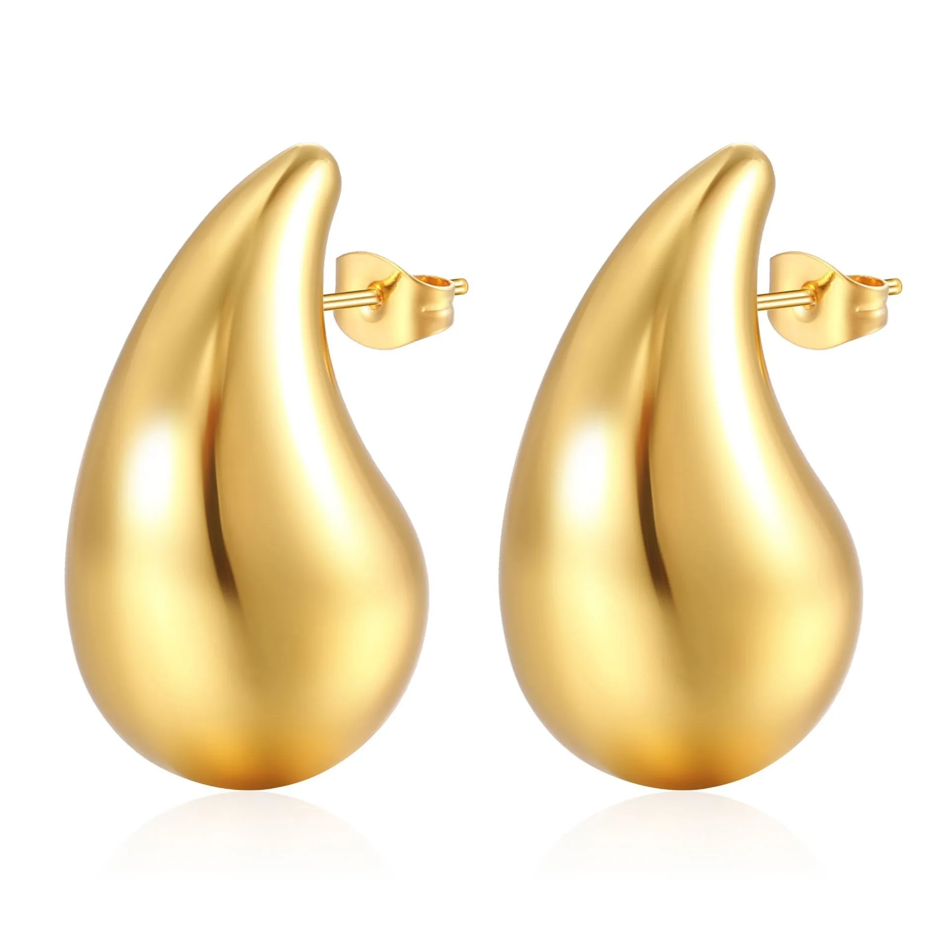 gold teardrop stud earrings on white background